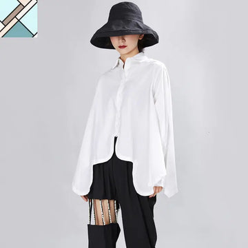 Sonoya Lapel Long Sleeve Irregular Hem Shirt by Marigold Shadows MARIGOLD SHADOWS